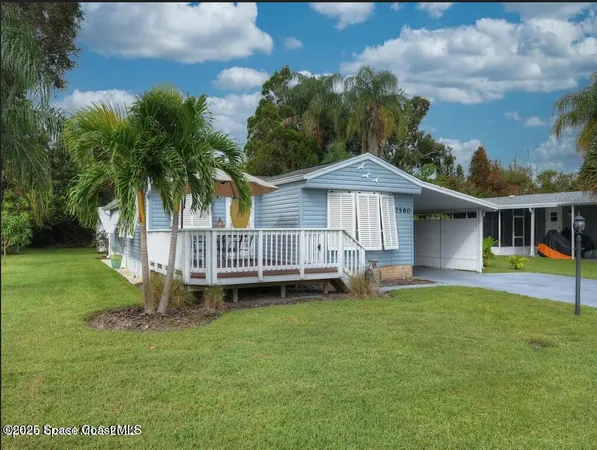a house with garden in front of it
