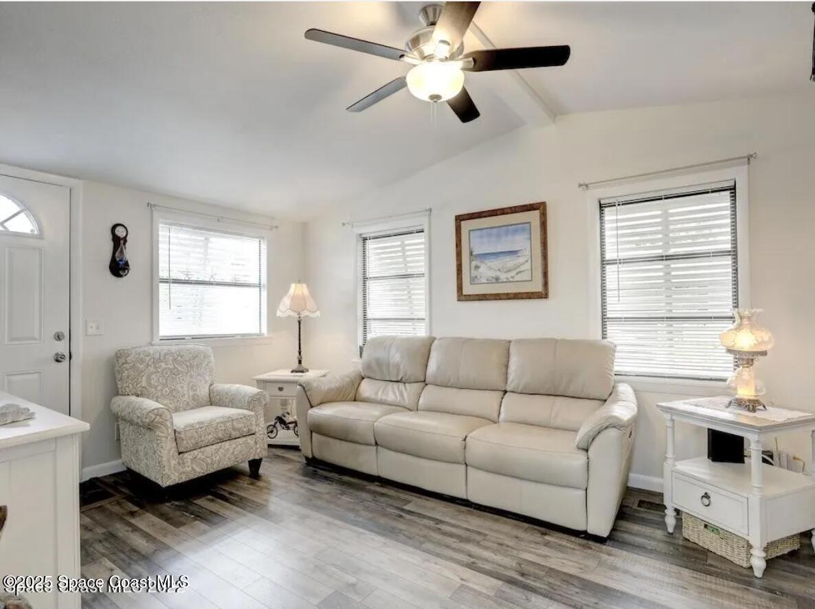 7560 Blackhawk Road Sebastian, FL 32976 - Photo 8 of 13 a living room with furniture and a large window