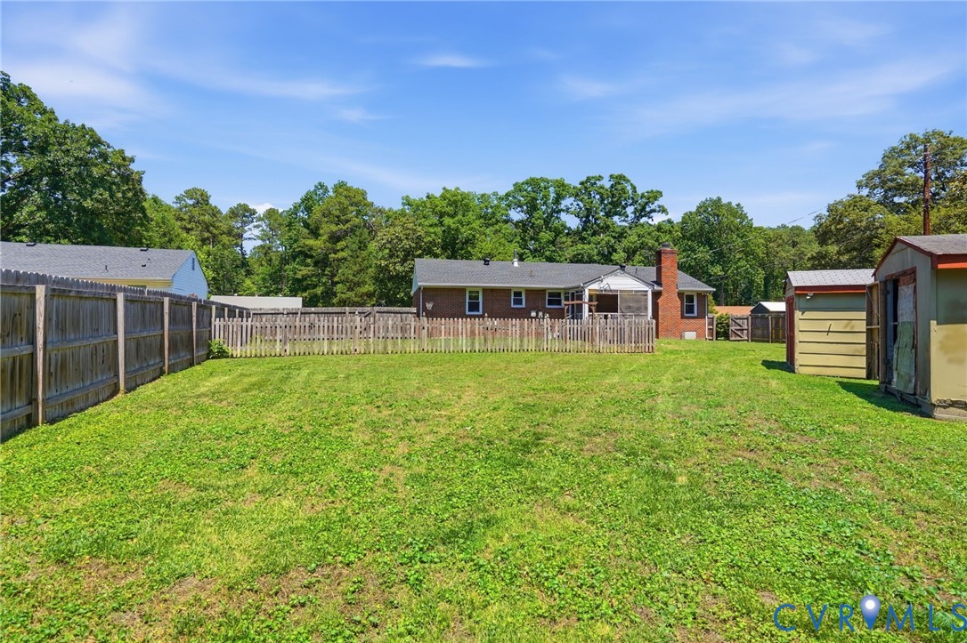2403 Omega Road Henrico, VA 23228 - Photo 32 of 39 a view of a house with backyard and sitting area