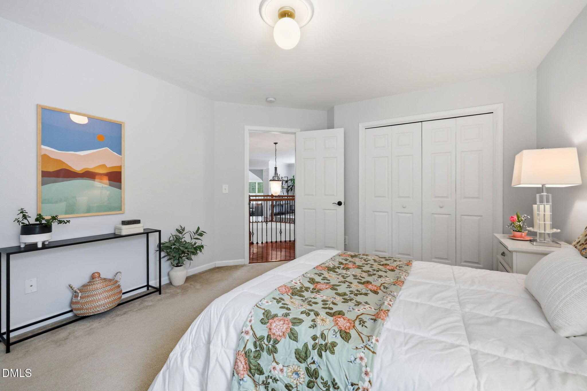 162 Gathering Place Durham, NC 27713 - Photo 28 of 52 a bedroom with a bed and a flat screen tv