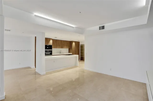 a view of a kitchen with a sink