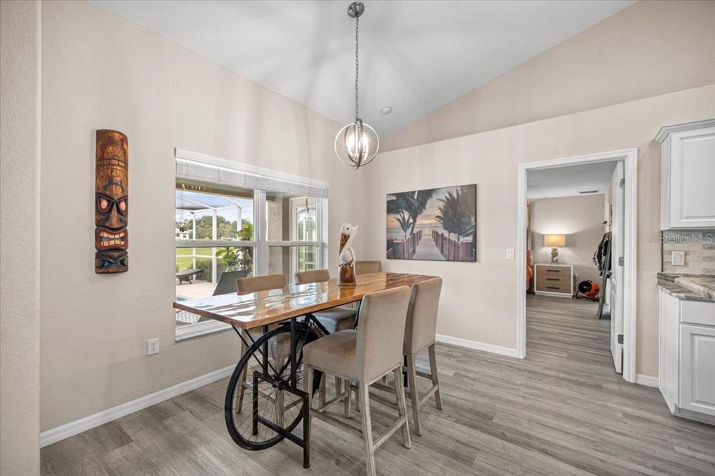 700 East Boston Street Hernando, FL 34442 - Photo 11 of 39 a view of a dining room with furniture window and wooden floor