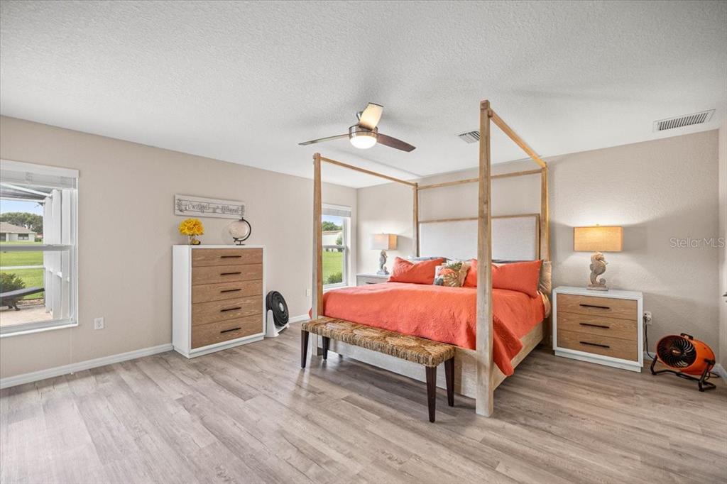 700 East Boston Street Hernando, FL 34442 - Photo 18 of 39 a bed room with a bed and a closet