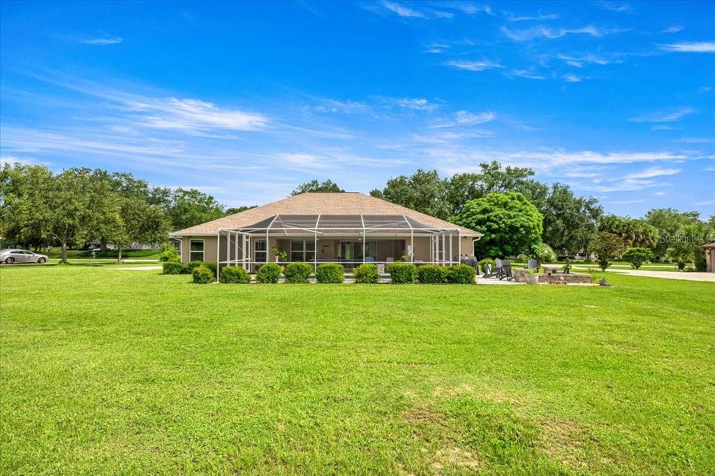 700 East Boston Street Hernando, FL 34442 - Photo 34 of 39 a front view of a house with a garden