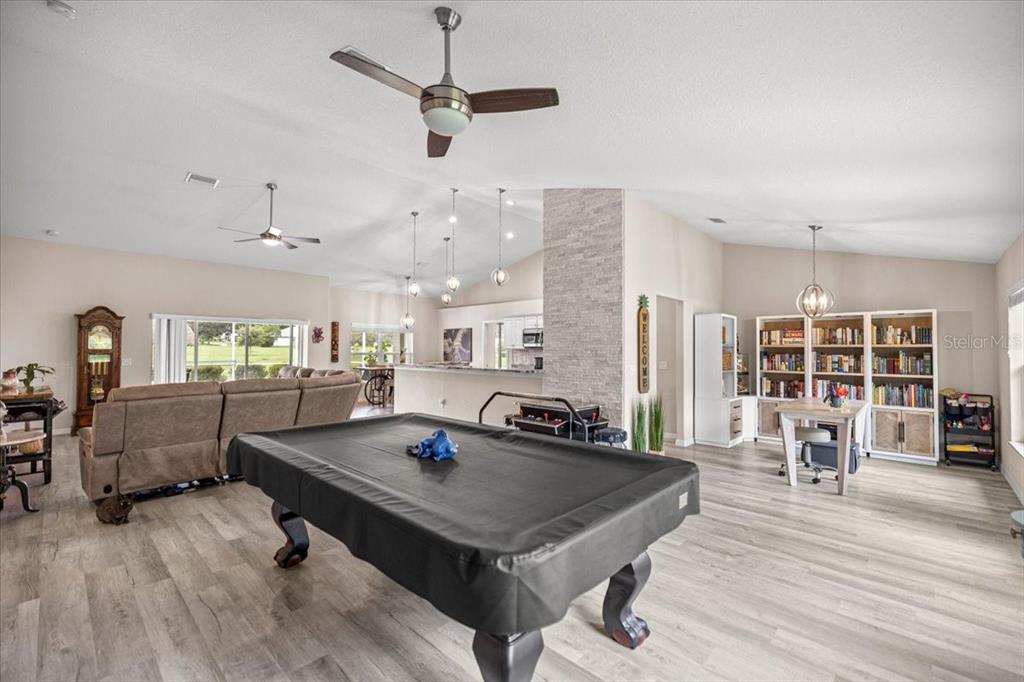 700 East Boston Street Hernando, FL 34442 - Photo 7 of 40 a living room with furniture and wooden floor