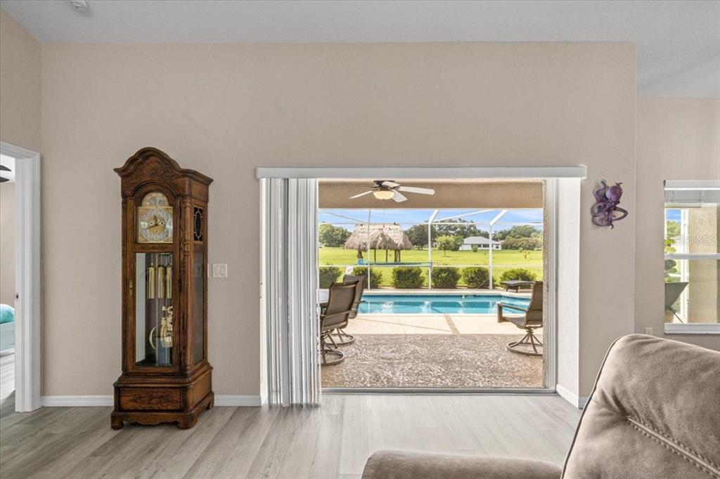 700 East Boston Street Hernando, FL 34442 - Photo 9 of 40 a living room with furniture and a large window