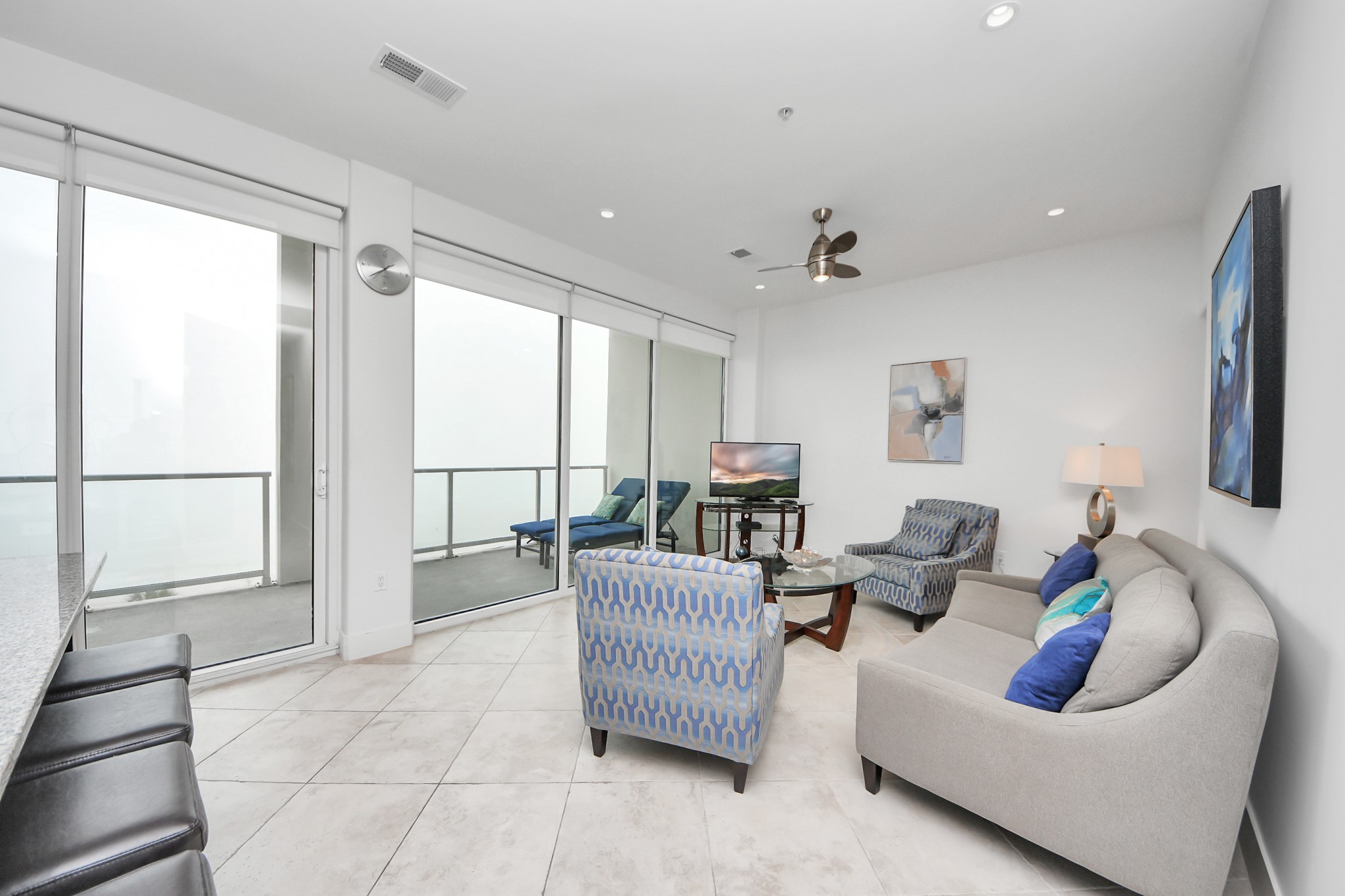 10327 Termini-San Luis Pass Road, Unit 617 Galveston, TX 77554 - Photo 14 of 50 a living room with furniture and a large window