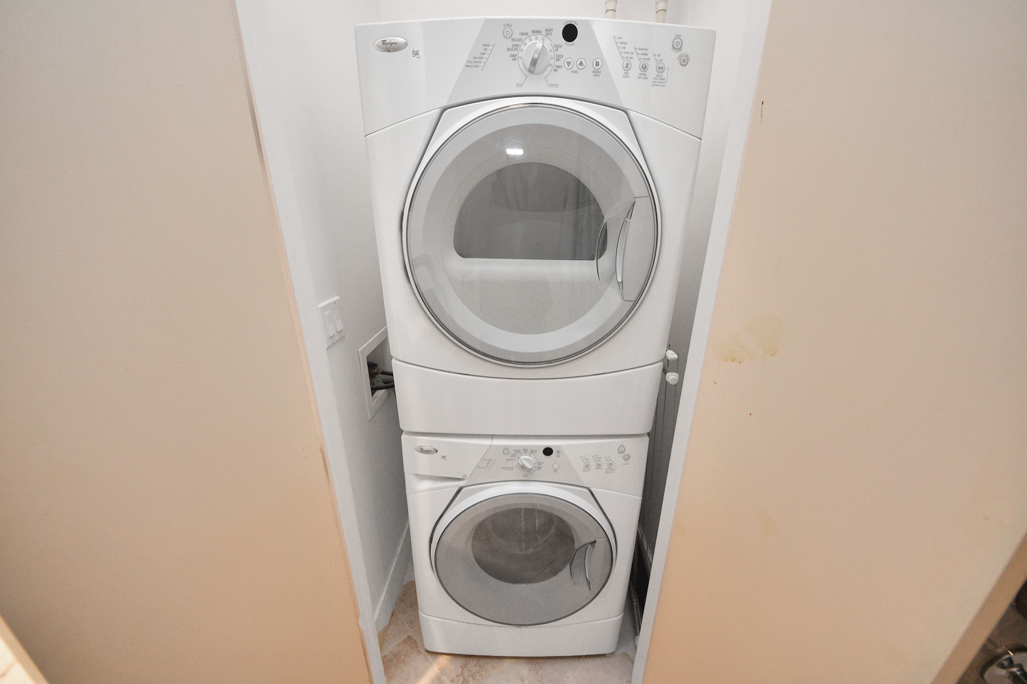 10327 Termini-San Luis Pass Road, Unit 617 Galveston, TX 77554 - Photo 34 of 50 a utility room with dryer and washer
