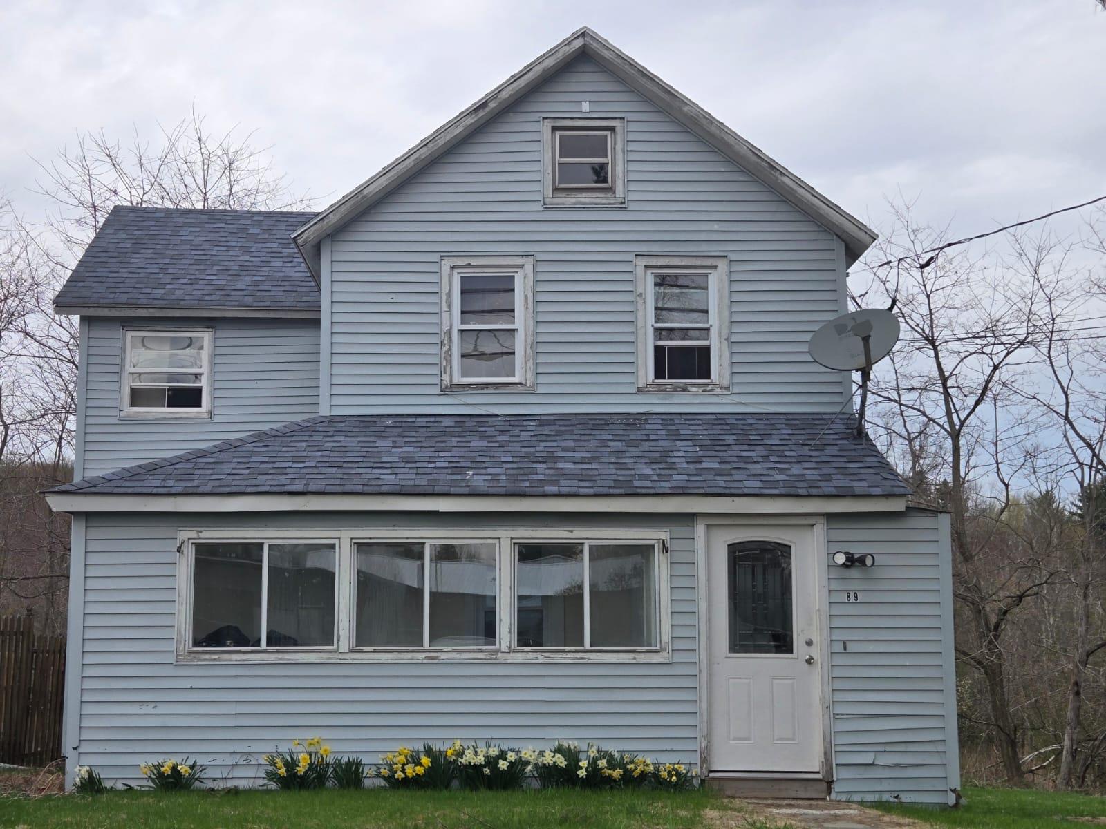 89 Cold Spring Road Monticello, NY 12701 - Photo 2 of 3 a front view of a house