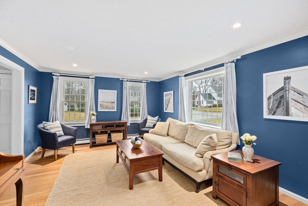 9 Windward Lane Scituate, MA 02066 - Photo 3 of 37 a living room with furniture and large window