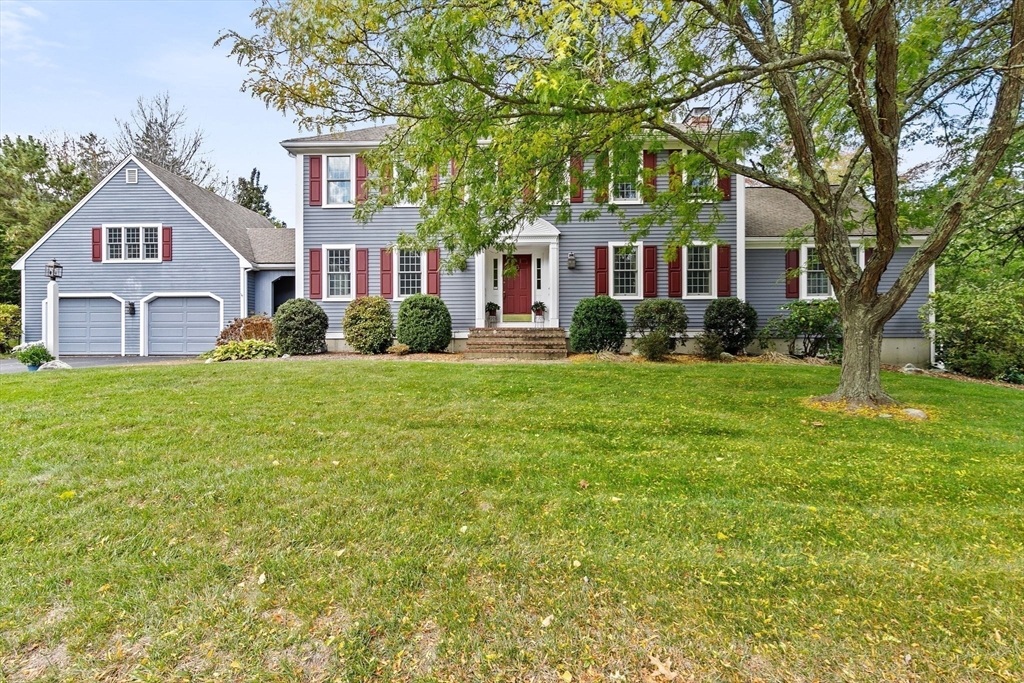 9 Windward Lane Scituate, MA 02066 - Photo 34 of 37 a front view of a house with a yard and trees
