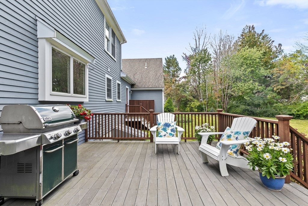 9 Windward Lane Scituate, MA 02066 - Photo 36 of 37 a view of a deck with furniture and wooden floor
