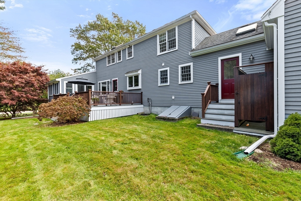 9 Windward Lane Scituate, MA 02066 - Photo 37 of 37 a front view of a house with a yard