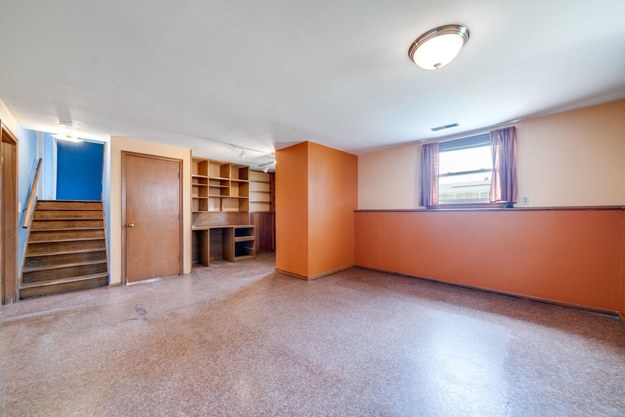 1611 Notre Dame Road Rockford, IL 61103 - Photo 23 of 33 an empty room with furniture and wooden floor