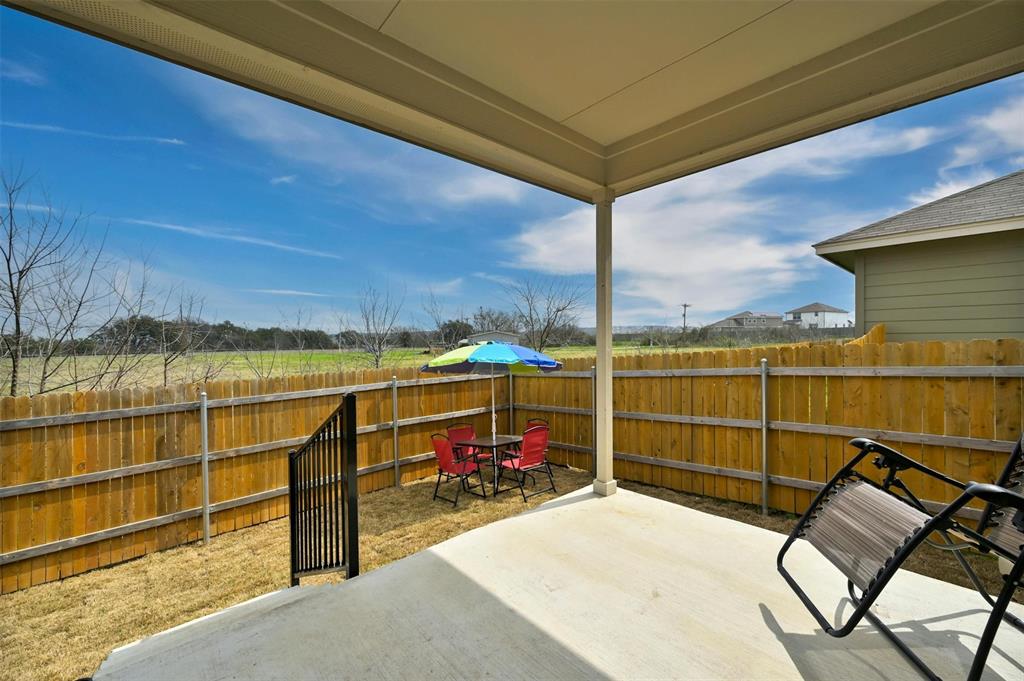 1045 Taggart Trail Jarrell, TX 76537 - Photo 18 of 19 View of patio / terrace with outdoor dining area
