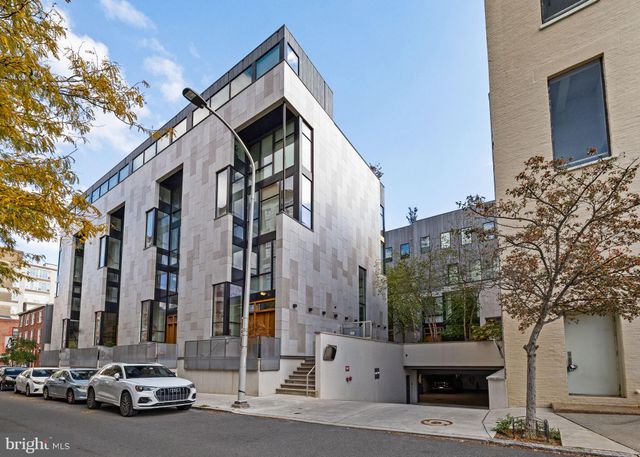 a car parked in front of a building