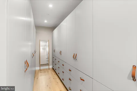 a view of hallway with mirror