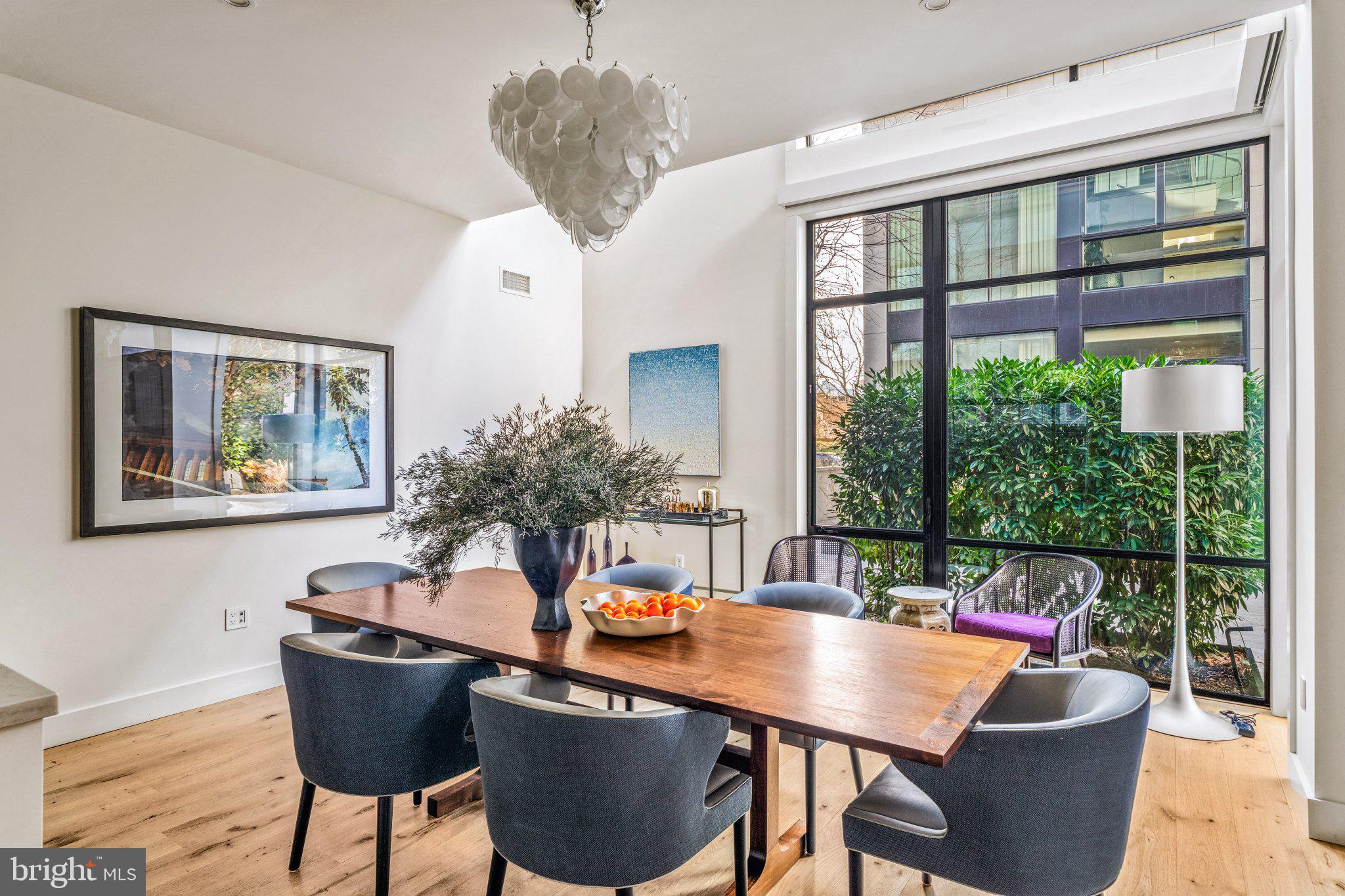 249 South 24th Street, Unit H Philadelphia, PA 19103 - Photo 3 of 35 Bright dining space with lush views.