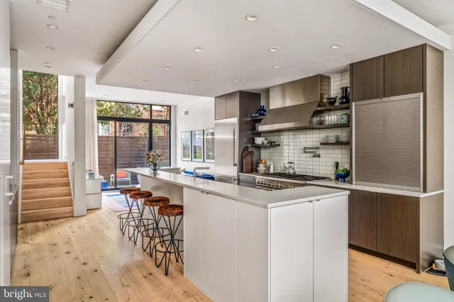 a backyard of a house with seating space