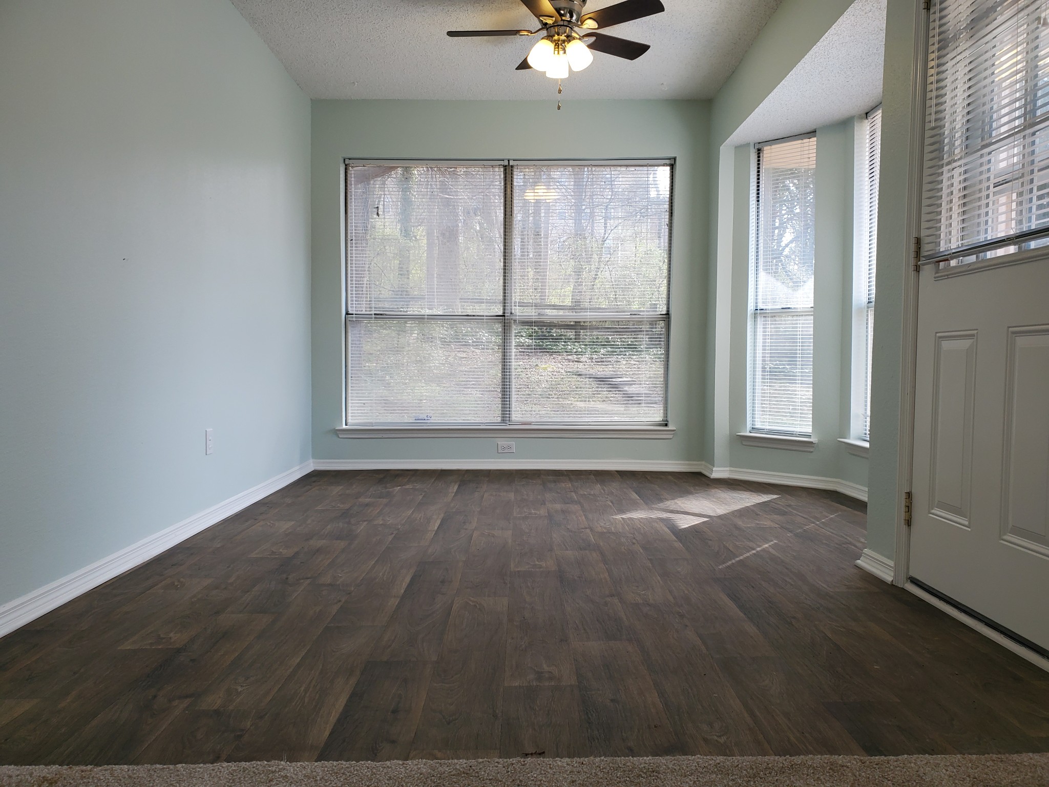 1217 Jacksons View Road Hermitage, TN 37076 - Photo 6 of 14 an empty room with wooden floor and windows