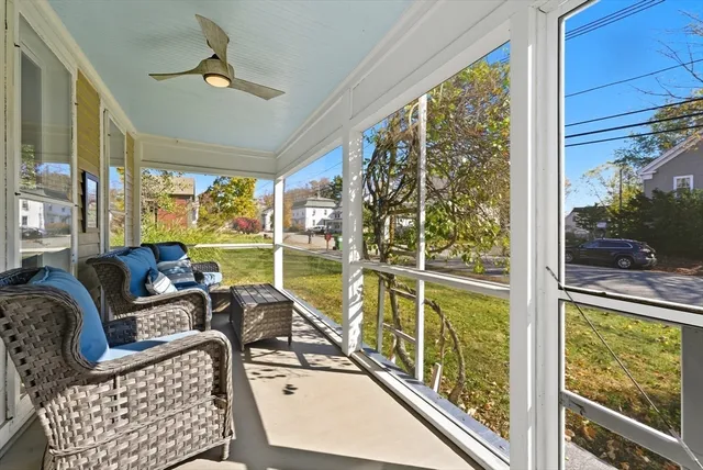 a living room with large windows