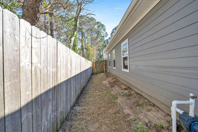 2247 Wind Trace Road North Navarre, FL 32566 - Photo 31 of 34 2247 Wind Trace_ Side Yard