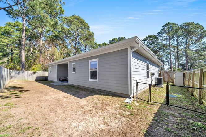 2247 Wind Trace Road North Navarre, FL 32566 - Photo 4 of 34 2247 Wind Trace_ Rear View