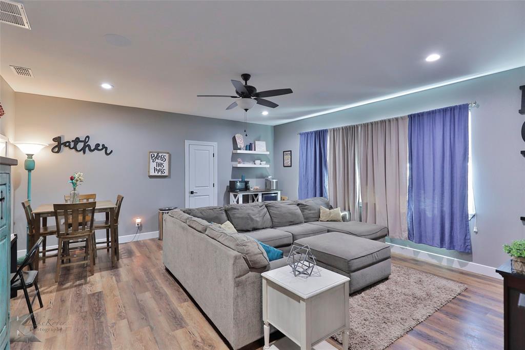 125 Wallace Court Tuscola, TX 79562 - Photo 31 of 40 a living room with furniture and wooden floor