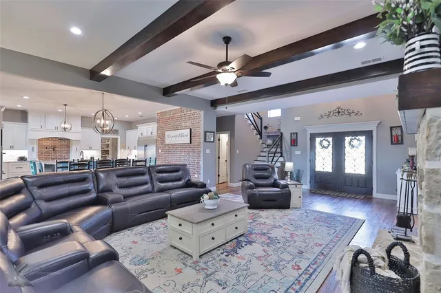 a large living room with furniture