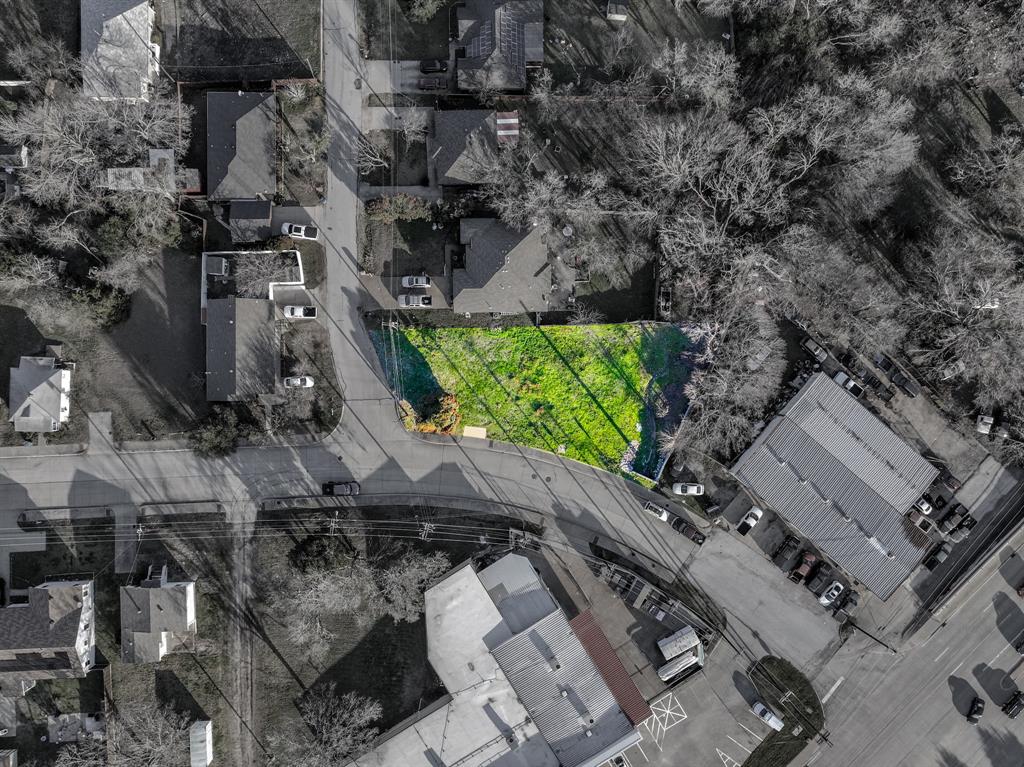 an aerial view of residential house with outdoor space