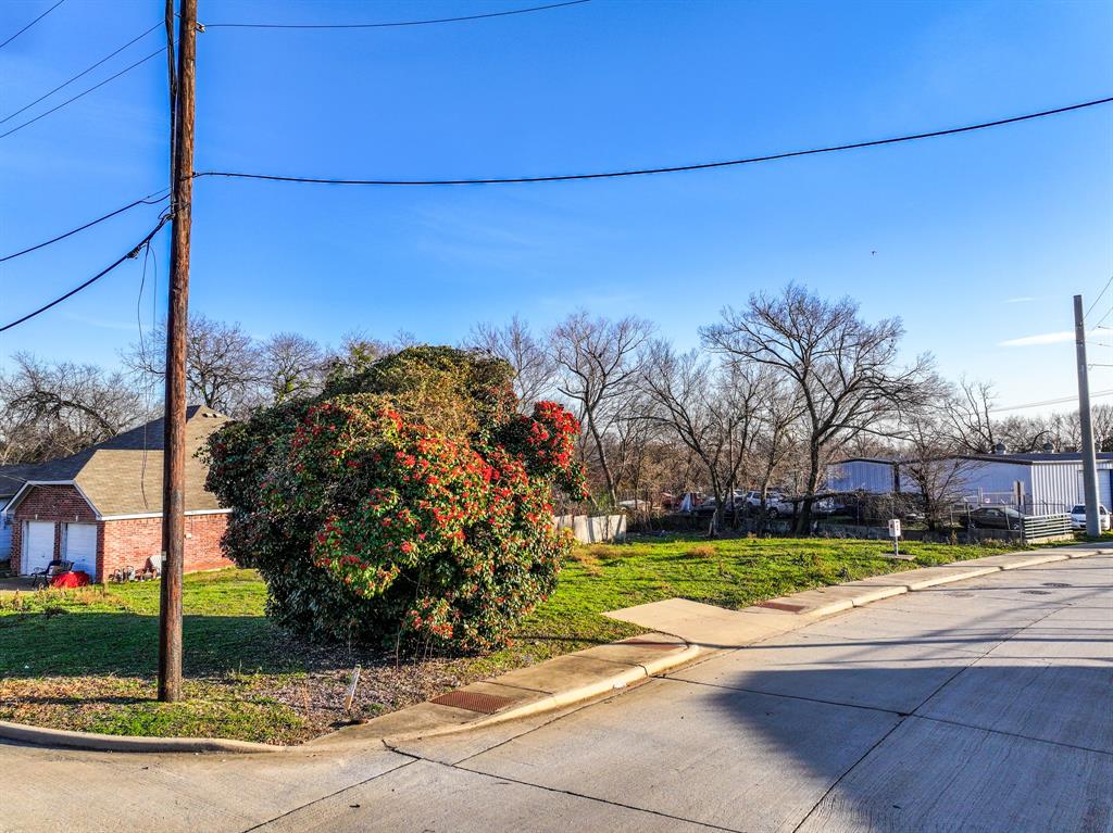 Tbd Dickey Street Rockwall, TX 75087 - Photo 5 of 13 a view of a street with a building in the background
