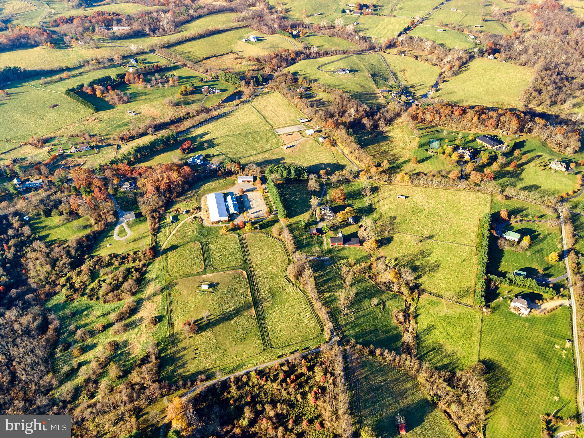 36589 Paxson Road Purcellville, VA 20132 - Photo 36 of 39 View of the 16-acres with the equestrian facility