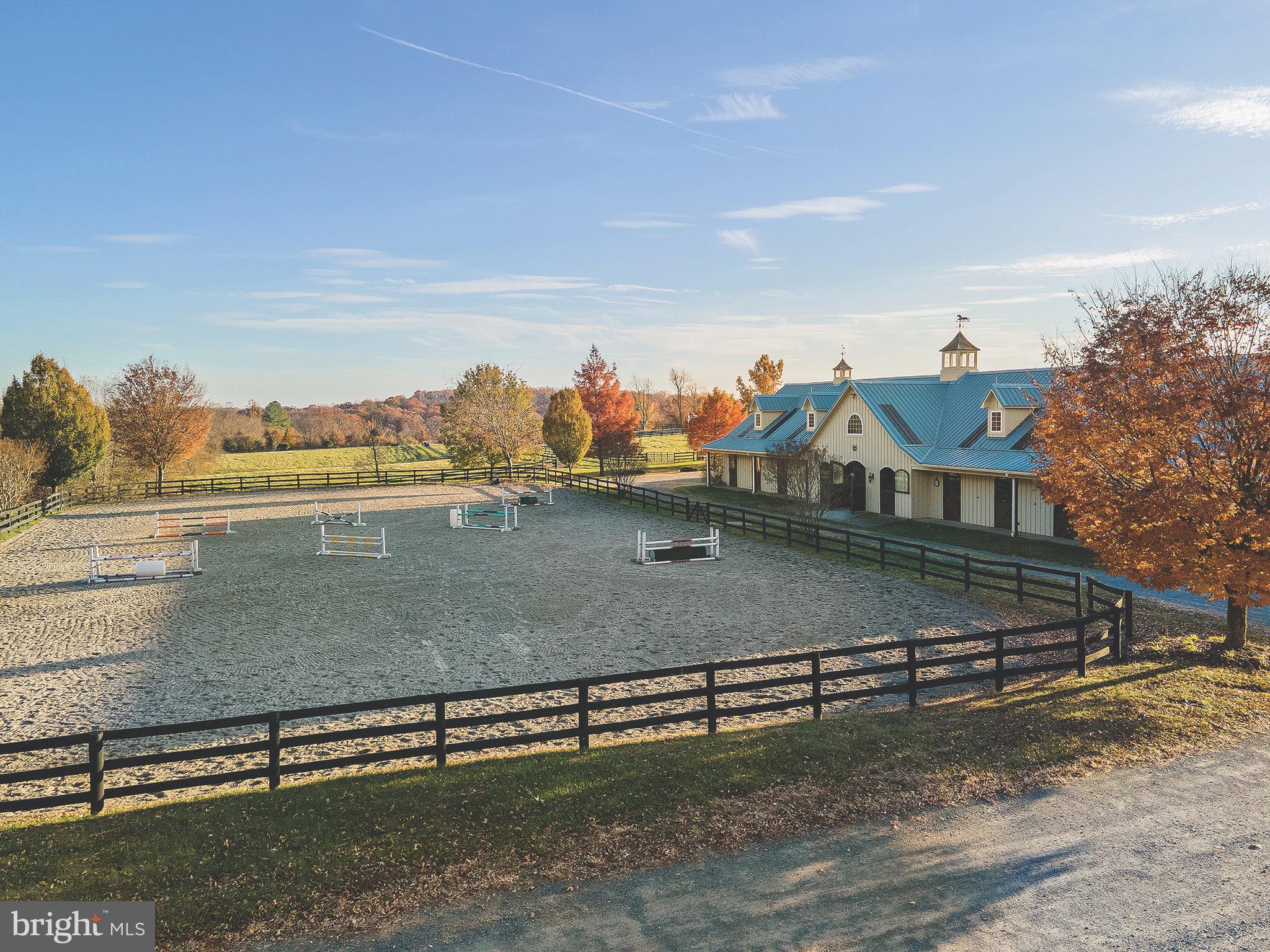 36589 Paxson Road Purcellville, VA 20132 - Photo 4 of 39 Fenced outdoor riding ring next to the barn