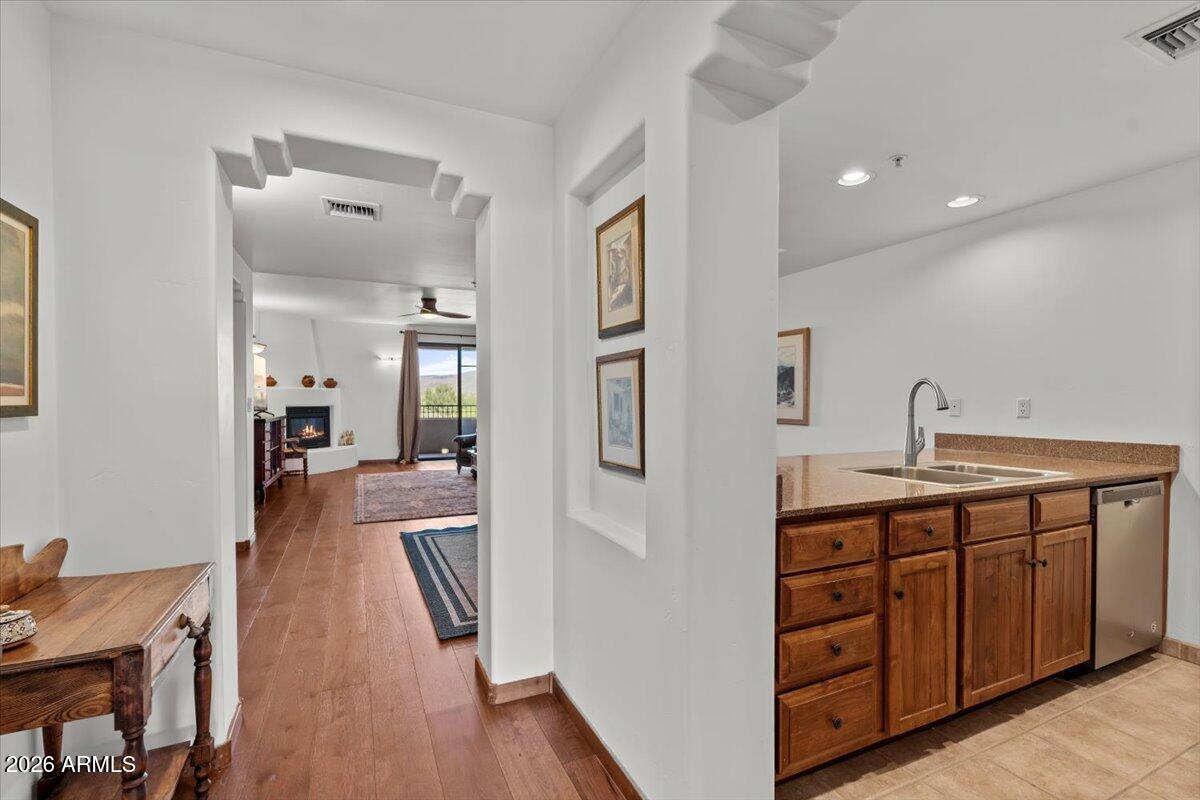 36601 North Mule Train Road, Unit C16 Carefree, AZ 85377 - Photo 17 of 35 a spacious bathroom with a double vanity sink and a mirror
