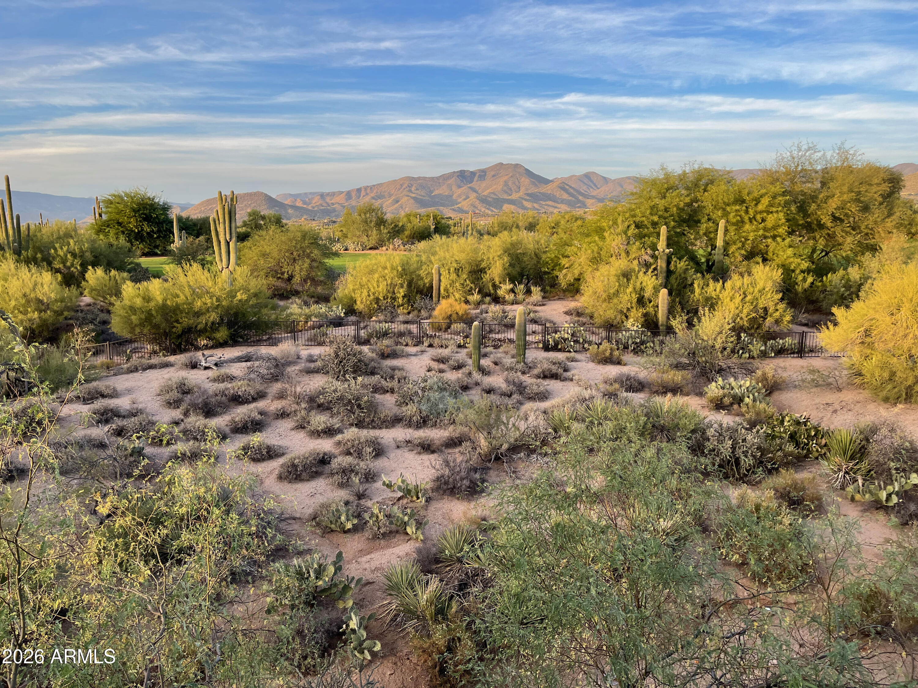 36601 North Mule Train Road, Unit C16 Carefree, AZ 85377 - Photo 27 of 35 a view of a yard with an ocean view