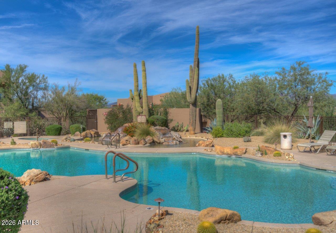 36601 North Mule Train Road, Unit C16 Carefree, AZ 85377 - Photo 32 of 35 a view of a backyard with sitting area
