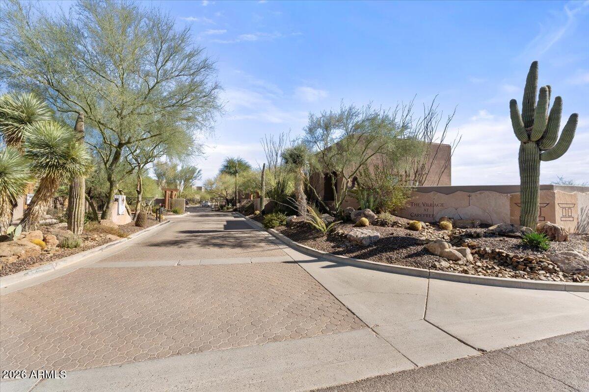 36601 North Mule Train Road, Unit C16 Carefree, AZ 85377 - Photo 4 of 35 a view of a street with a building in the background