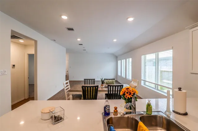 a view of kitchen and a sink