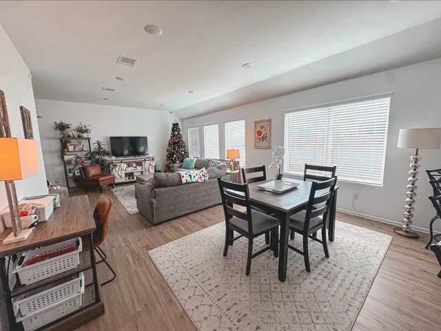 a view of a dining room with furniture