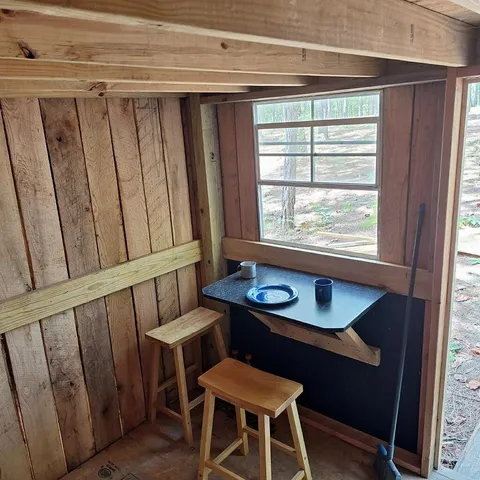 a view of a room with furniture