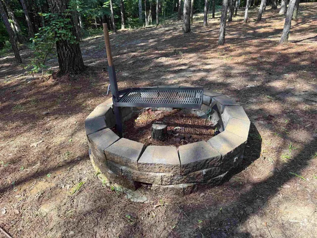 a view of a wooden house with a yard