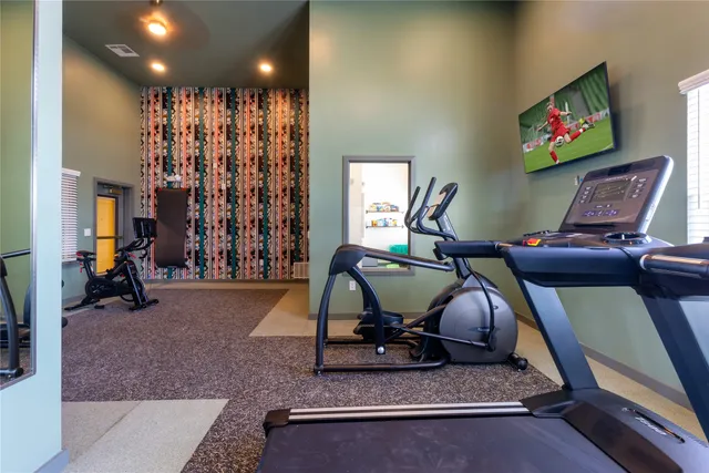 a view of a room with gym equipment