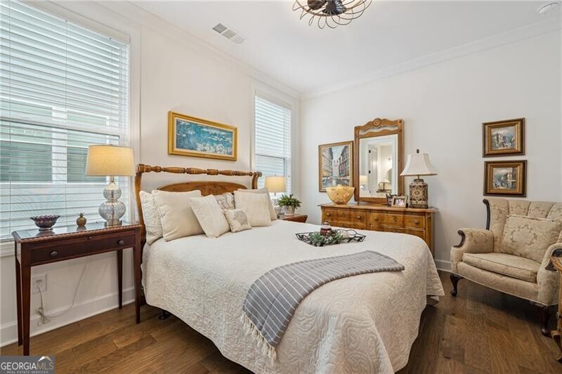 103 Rabun Court Hoschton, GA 30548 - Photo 16 of 22 a bedroom with bed and window