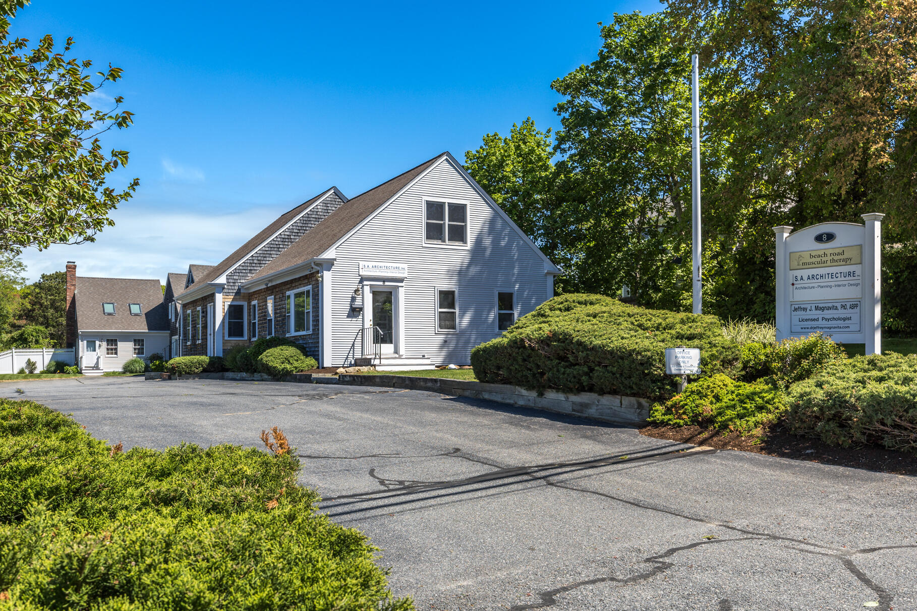 8 Beach Road, Unit 4 Orleans, MA 02653 - Photo 47 of 51 a view of a house with a yard and potted plants
