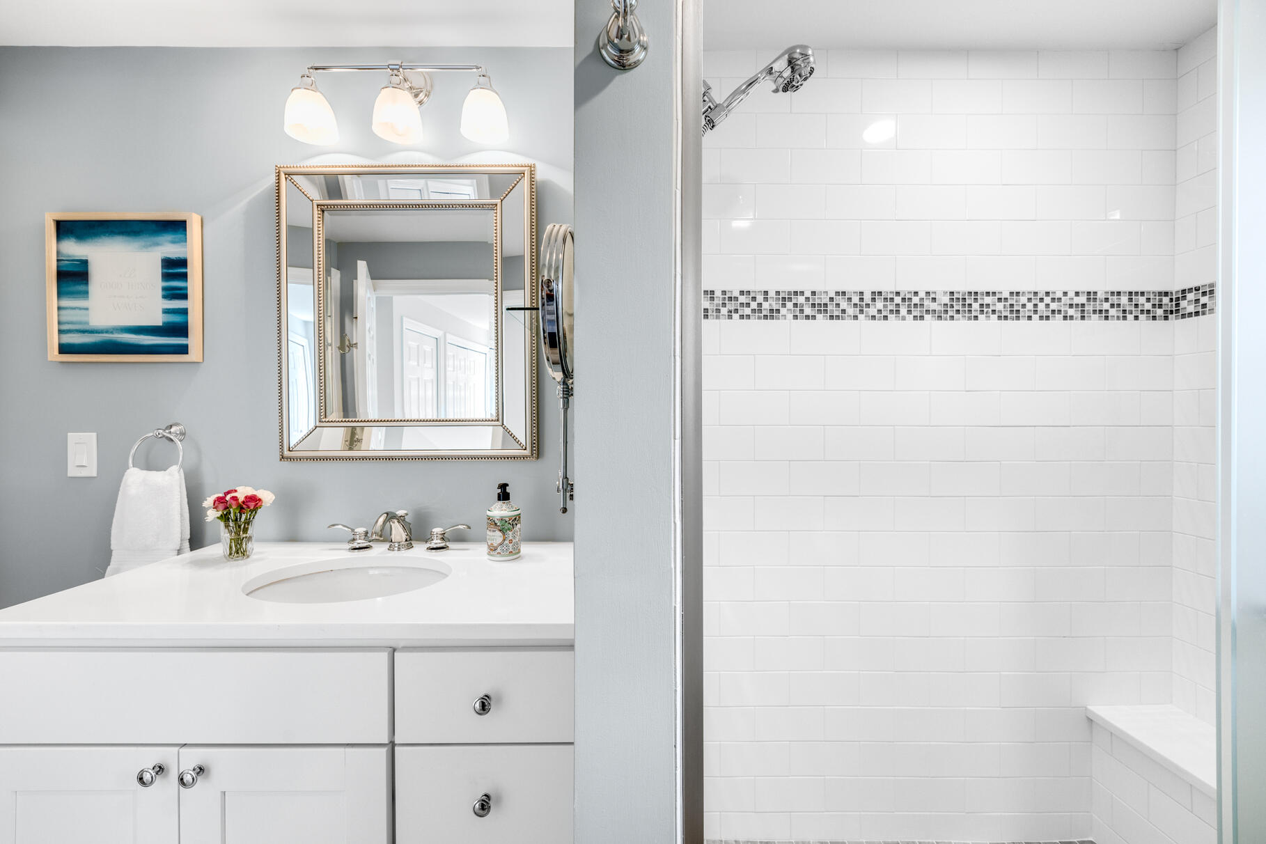 8 Beach Road, Unit 4 Orleans, MA 02653 - Photo 10 of 51 a bathroom with a sink and a mirror