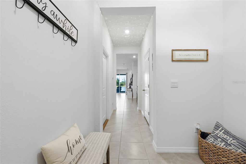 32992 Major Oak Drive Wesley Chapel, FL 33545 - Photo 2 of 56 a view of a hallway with couch