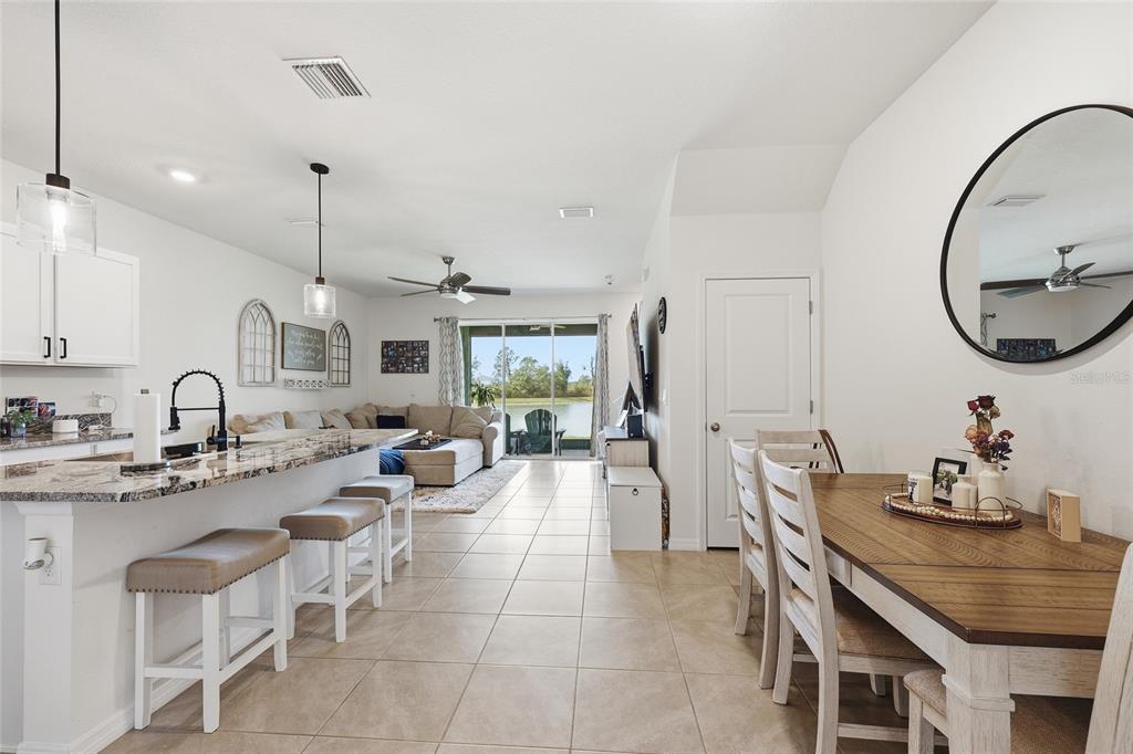 32992 Major Oak Drive Wesley Chapel, FL 33545 - Photo 4 of 56 a very nice looking dining room with a table and chairs