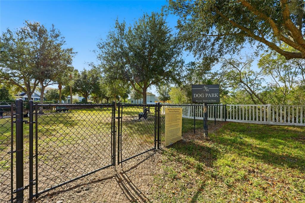 32992 Major Oak Drive Wesley Chapel, FL 33545 - Photo 50 of 56 a view of a garden with a fence
