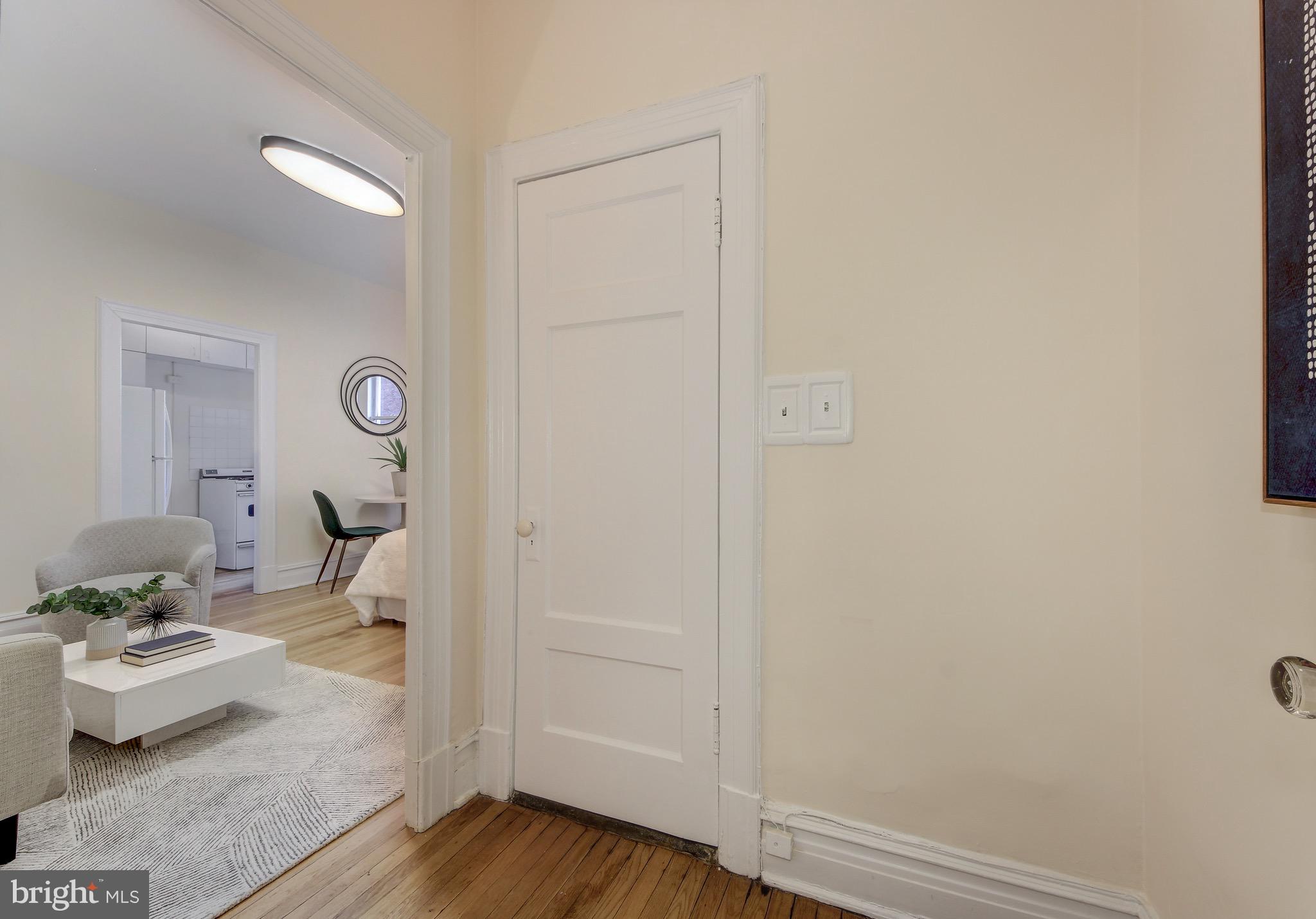 1526 17th Street Northwest, Unit 207 Washington, DC 20036 - Photo 16 of 49 a living room with furniture and a table