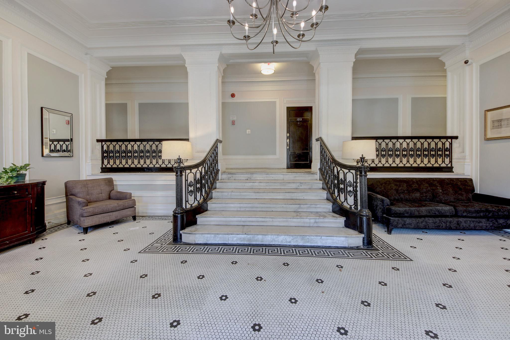 1526 17th Street Northwest, Unit 207 Washington, DC 20036 - Photo 18 of 49 a living room with furniture and a chandelier